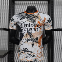 Real Madrid x Orange / Black Kit